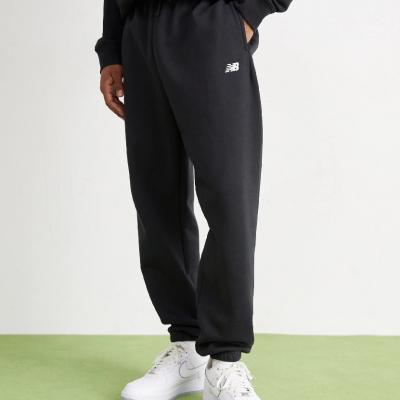 NEW BALANCE NEW SPORT ESSENTIALS FLEECE JOGGER - BLACK