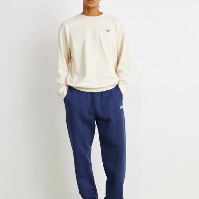 NEW BALANCE NEW SPORT ESSENTIALS FLEECE JOGGER - NB NAVY